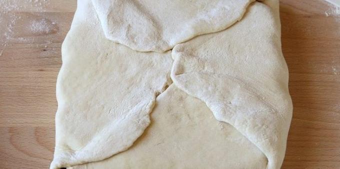 Hoe maak je een zelfgemaakte bladerdeeg koken: Wikkel de boter in het deeg