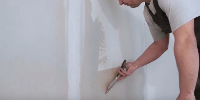 Uitlijnen wall putty: pas de dikte van de spatel helling plamuur