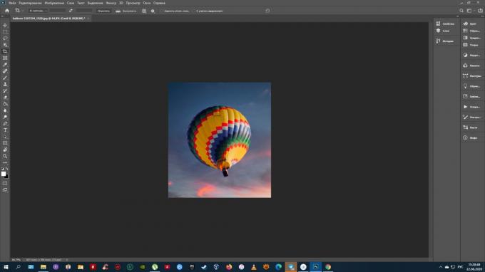 Een foto bijsnijden in Photoshop: druk op Enter (Windows) of Return (Mac OS)
